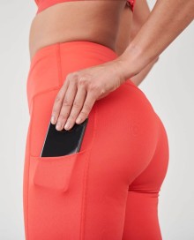 Elastyczne sportowe legginsy TOMBO® z kieszenią dla pani